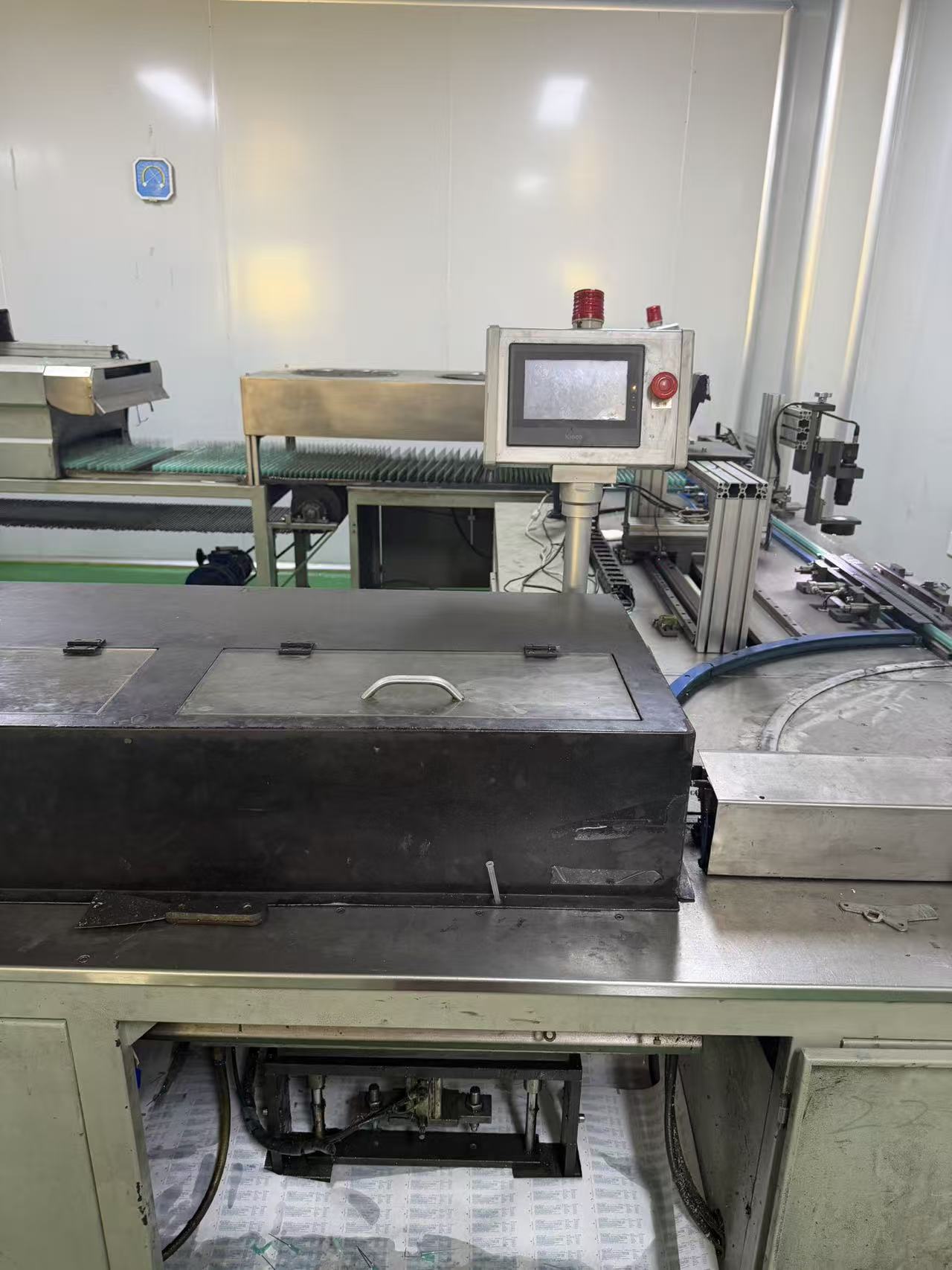 Adhesive needle applicator.