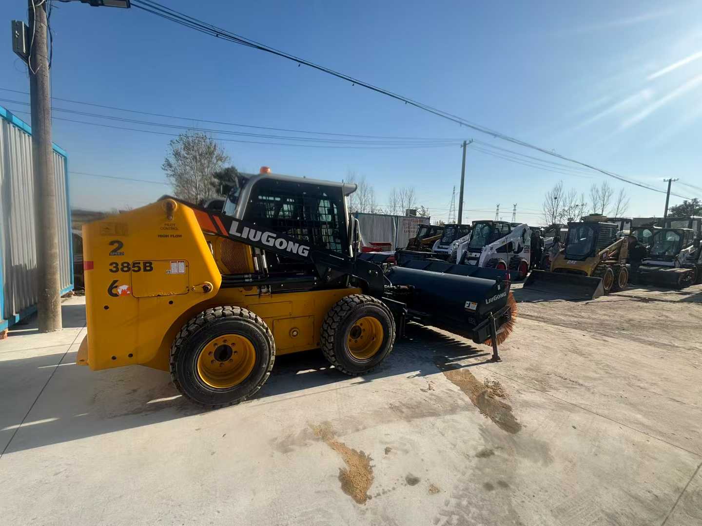 385B sliding loader.