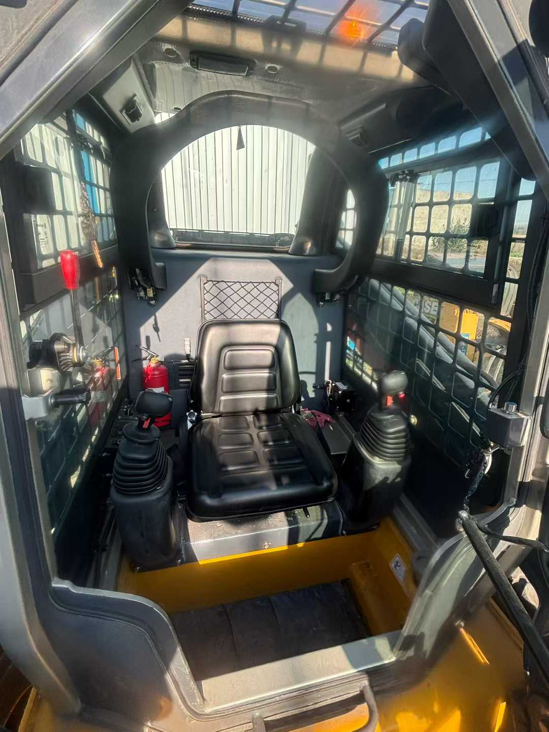 385B sliding loader.