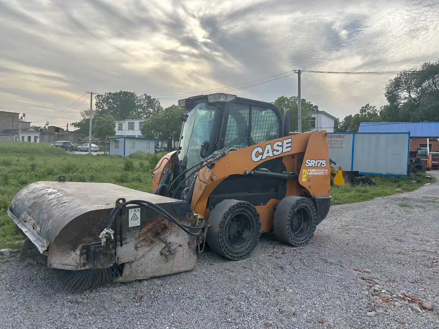 Two CASE Case SR175 sliding loader machines.