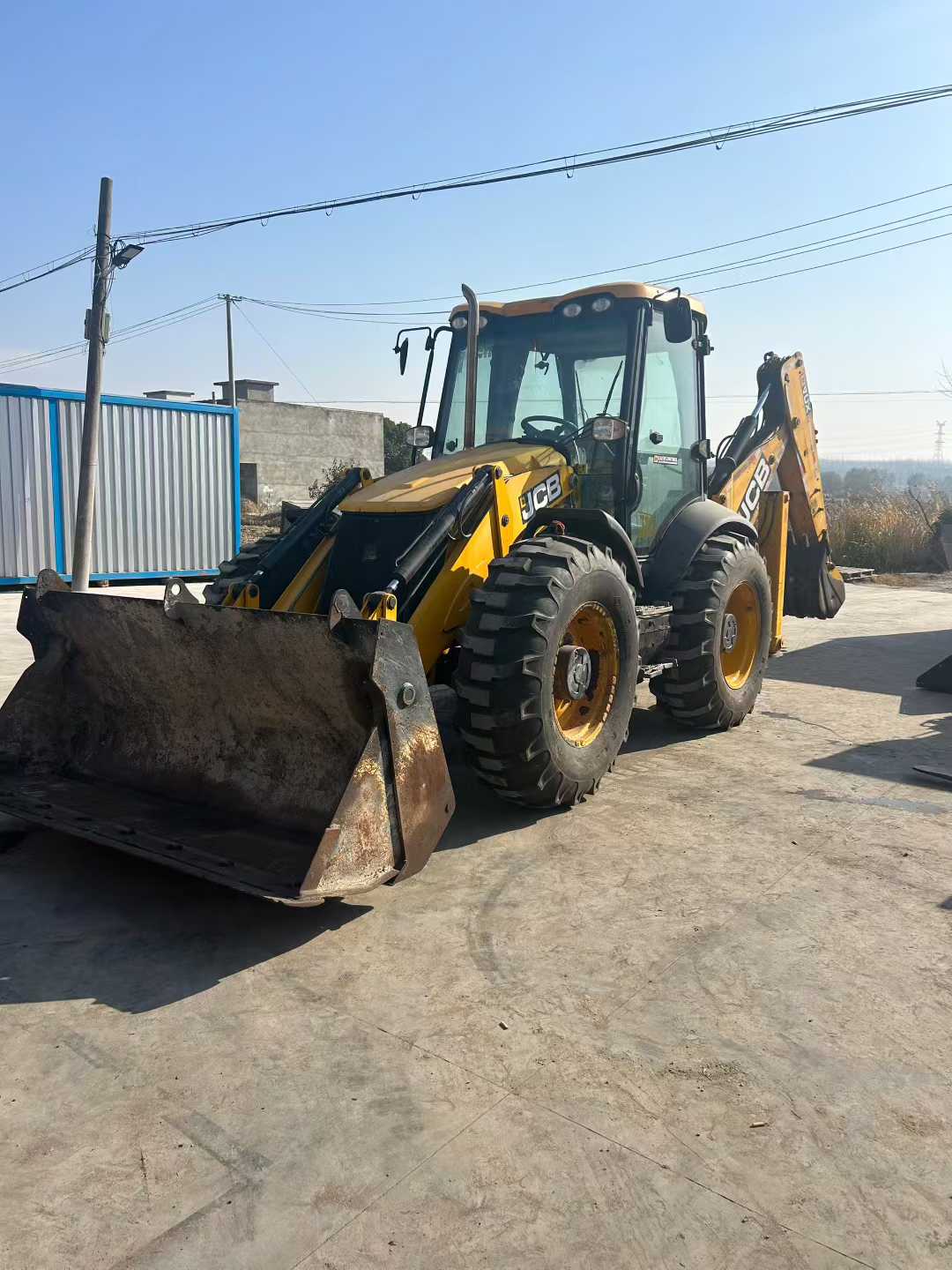 JCB4CX excavator-loader, dual-purpose machine.
