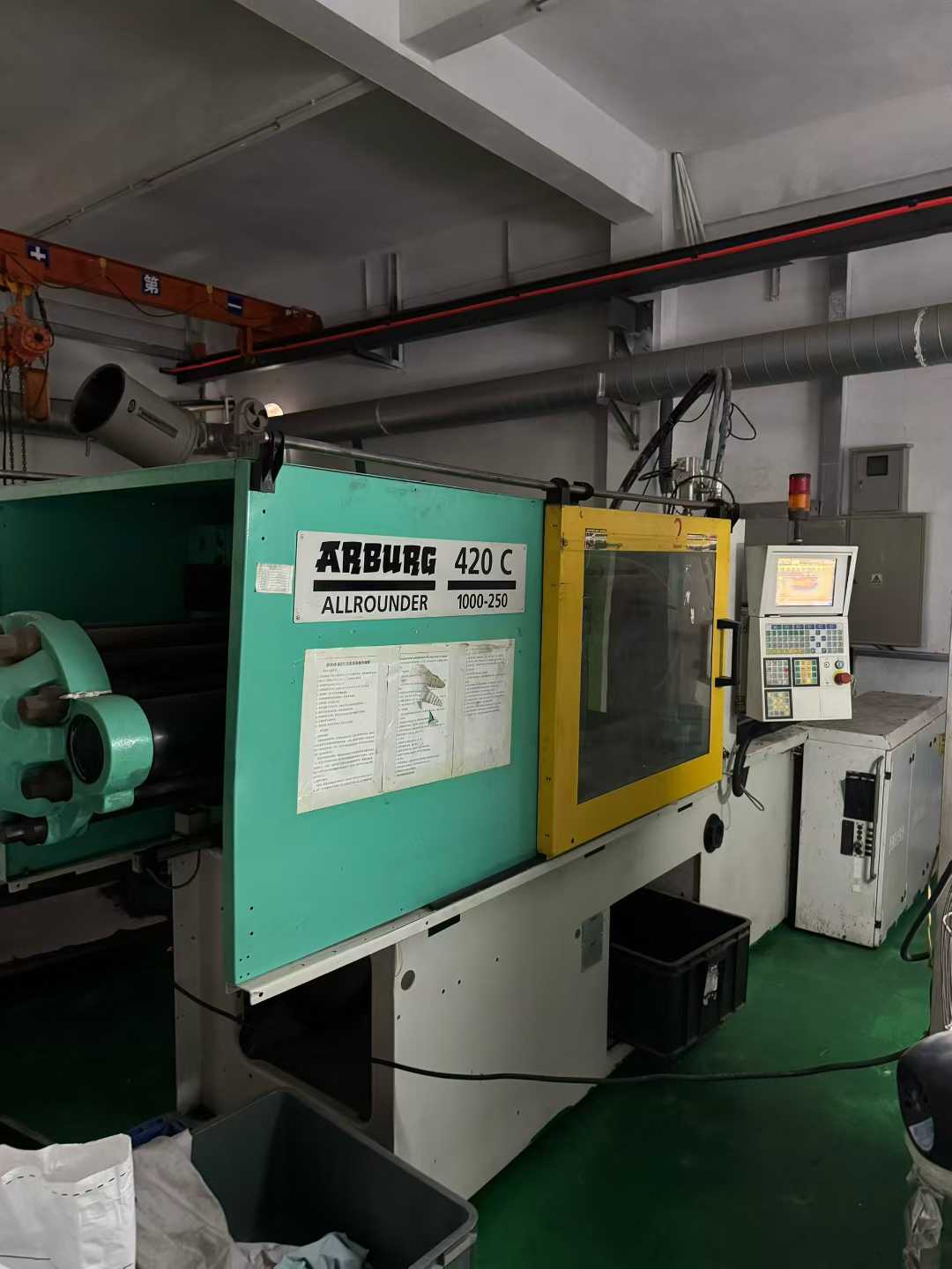 Two ABG 100T liquid silicone injection machines, equipped with two Kawasaki feeding systems.