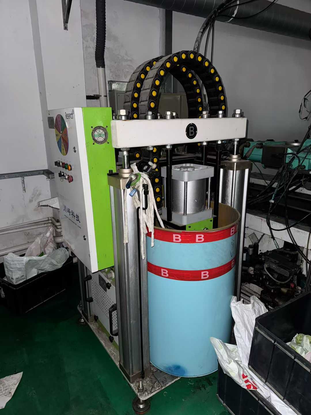 Two ABG 100T liquid silicone injection machines, equipped with two Kawasaki feeding systems.