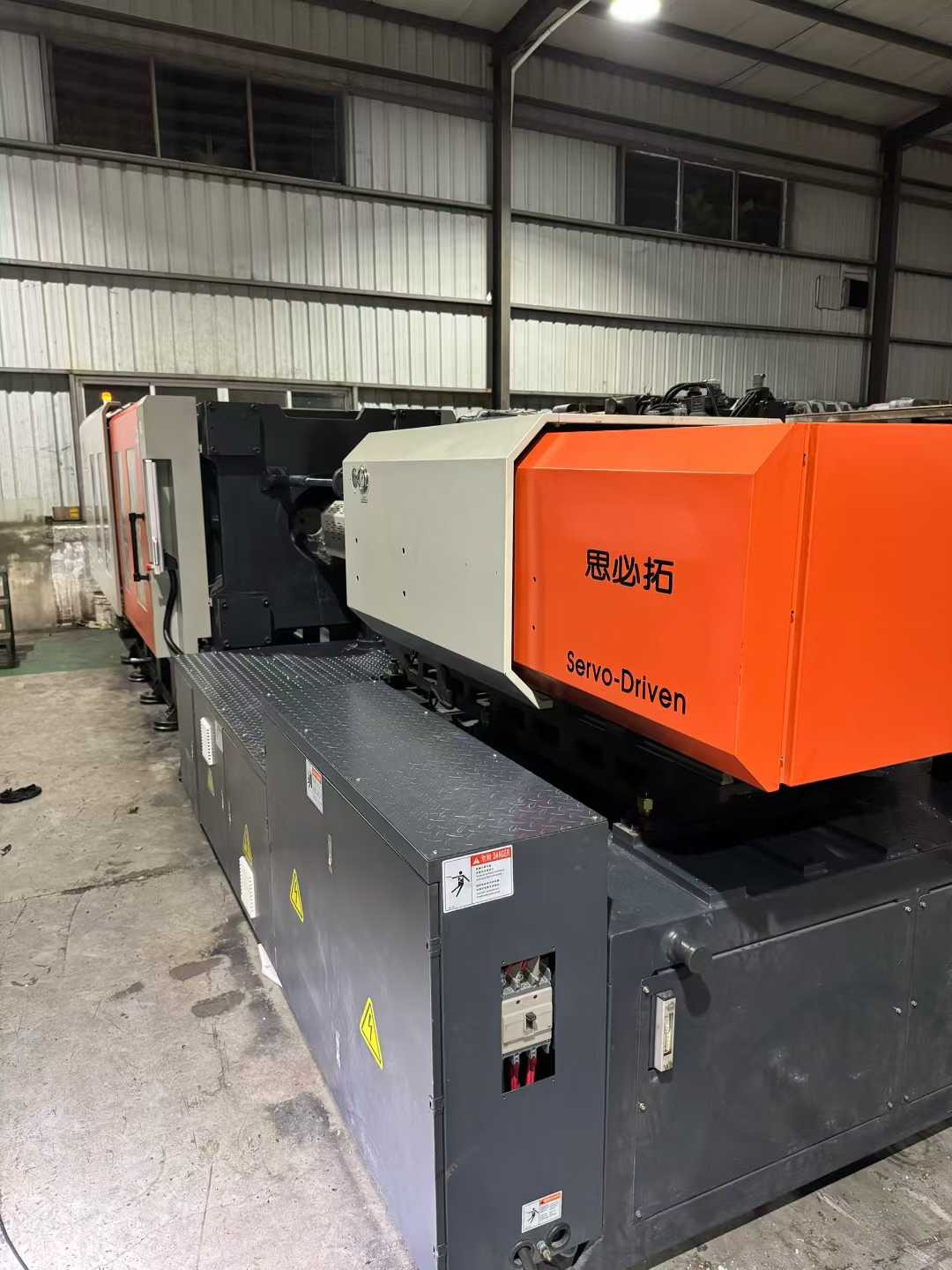 Spectro 520T servo injection machine by 2025.