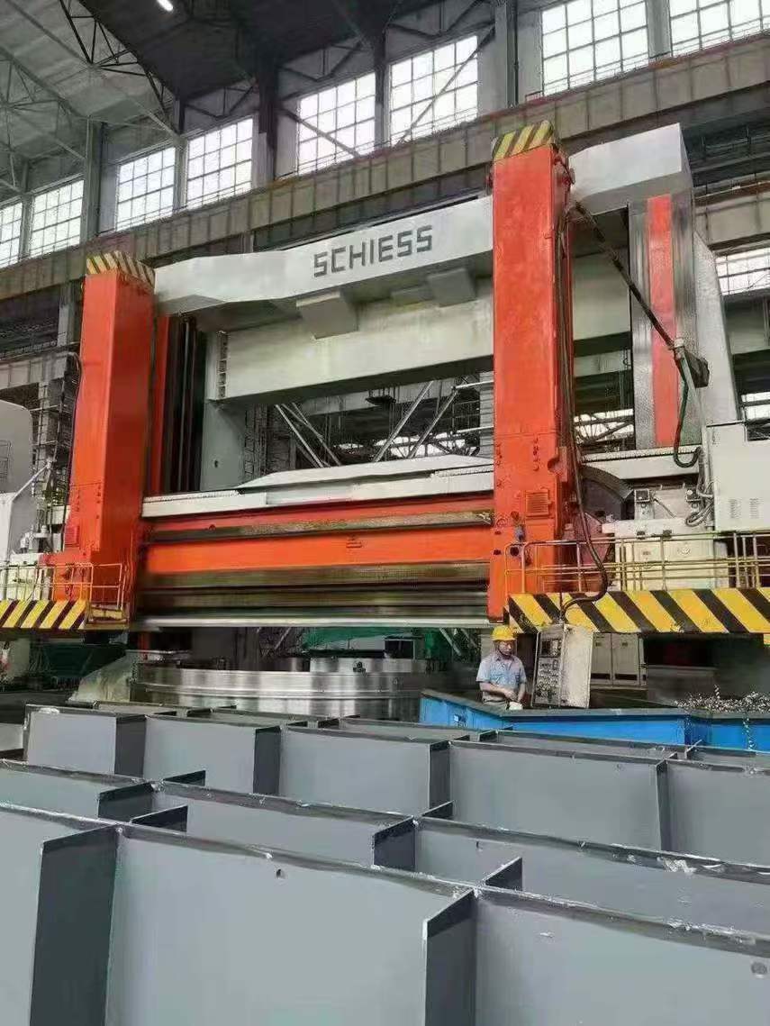 A German Sis 12.5-meter vertical lathe with a chucking table of 8 meters, capable of supporting a load of 205 tons and standing 5 meters tall.