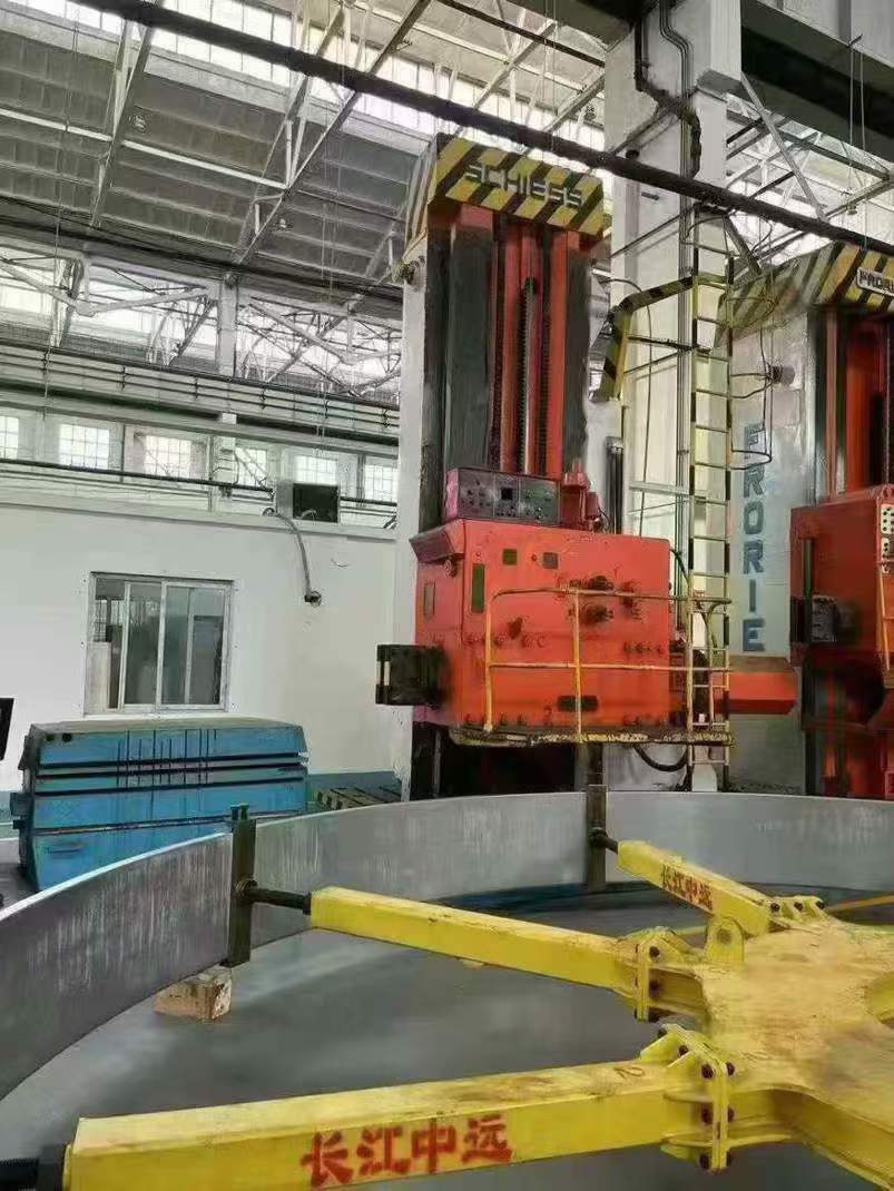 A German Sis 12.5-meter vertical lathe with a chucking table of 8 meters, capable of supporting a load of 205 tons and standing 5 meters tall.
