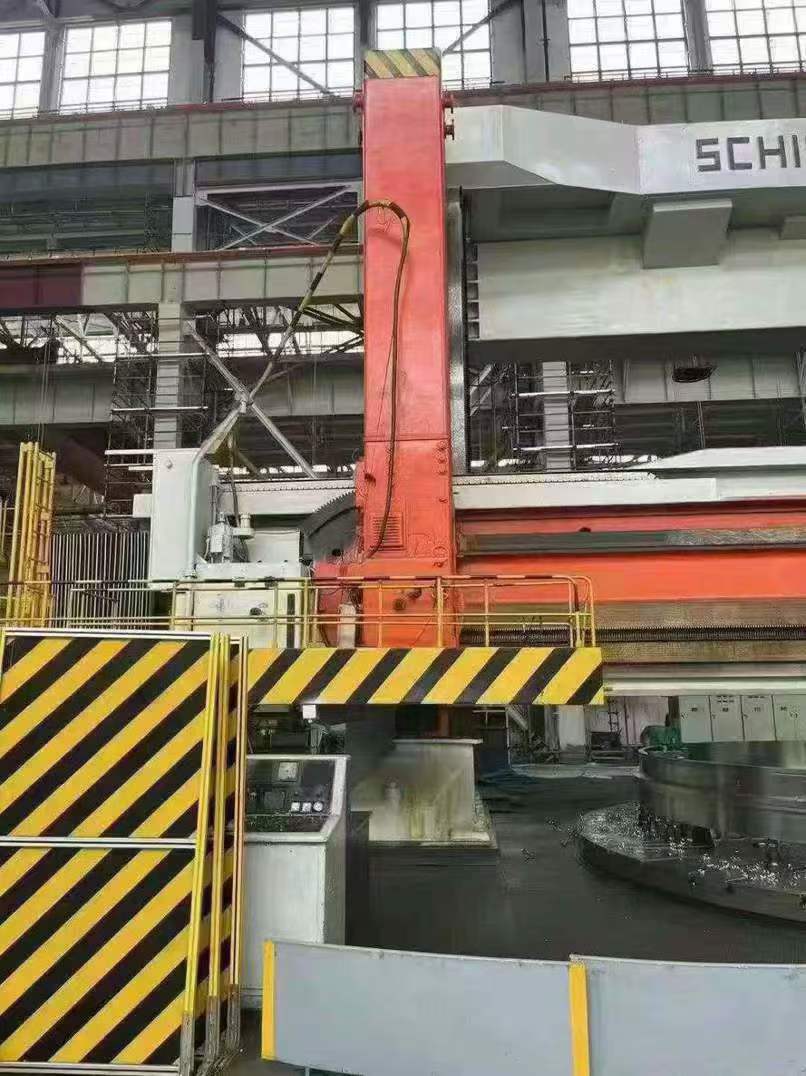 A German Sis 12.5-meter vertical lathe with a chucking table of 8 meters, capable of supporting a load of 205 tons and standing 5 meters tall.