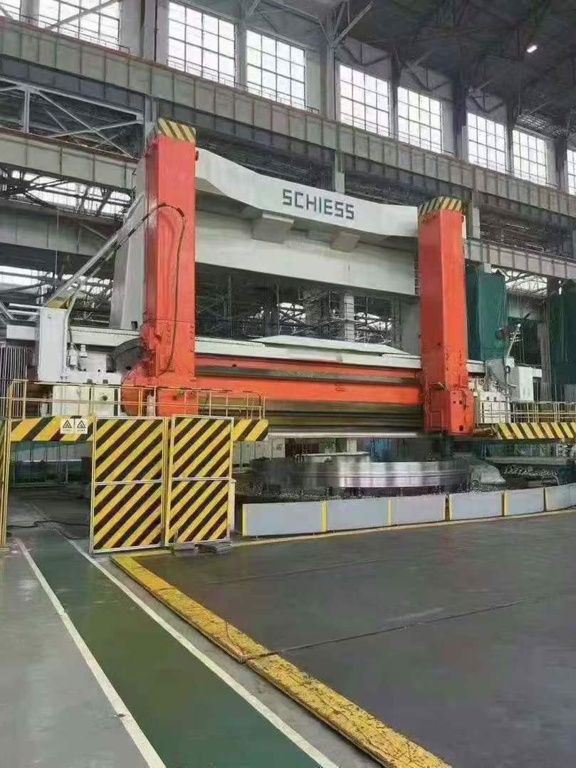 A German Sis 12.5-meter vertical lathe with a chucking table of 8 meters, capable of supporting a load of 205 tons and standing 5 meters tall.