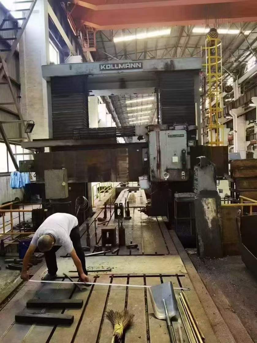 German KOLMAN 2×12 m heavy gantry milling machine! Door width: 2.4 m.