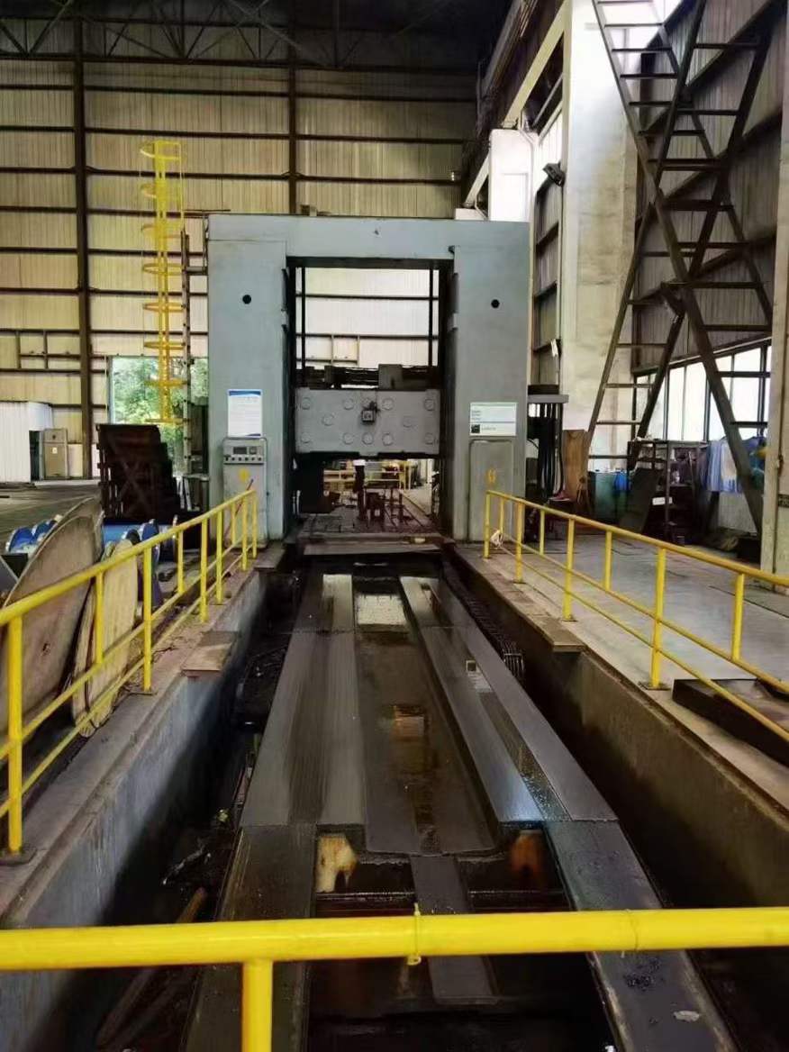 German KOLMAN 2×12 m heavy gantry milling machine! Door width: 2.4 m.