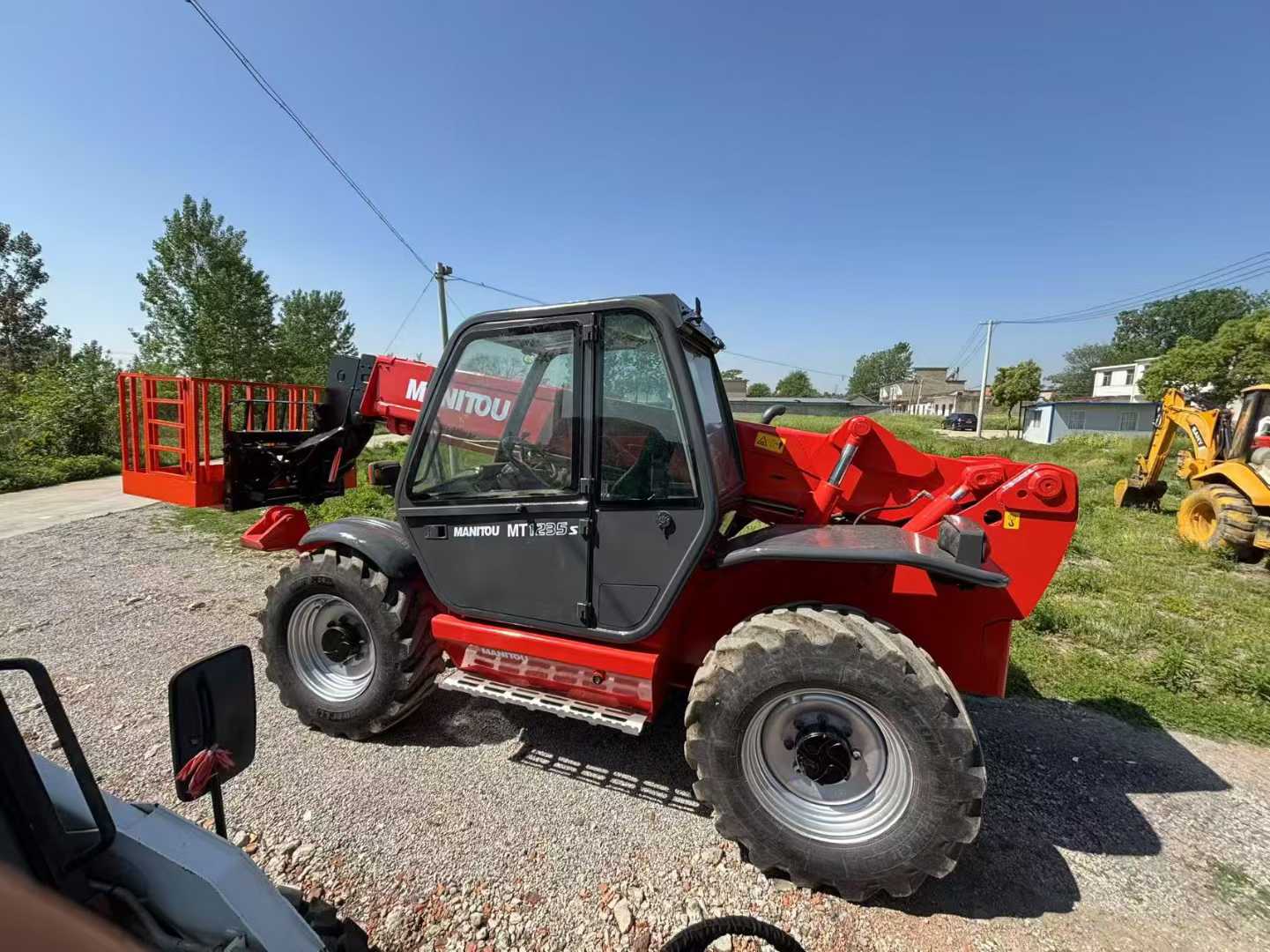Manitou Long 12m Forklift with 3.5 ton capacity, telescopic wall fork.
