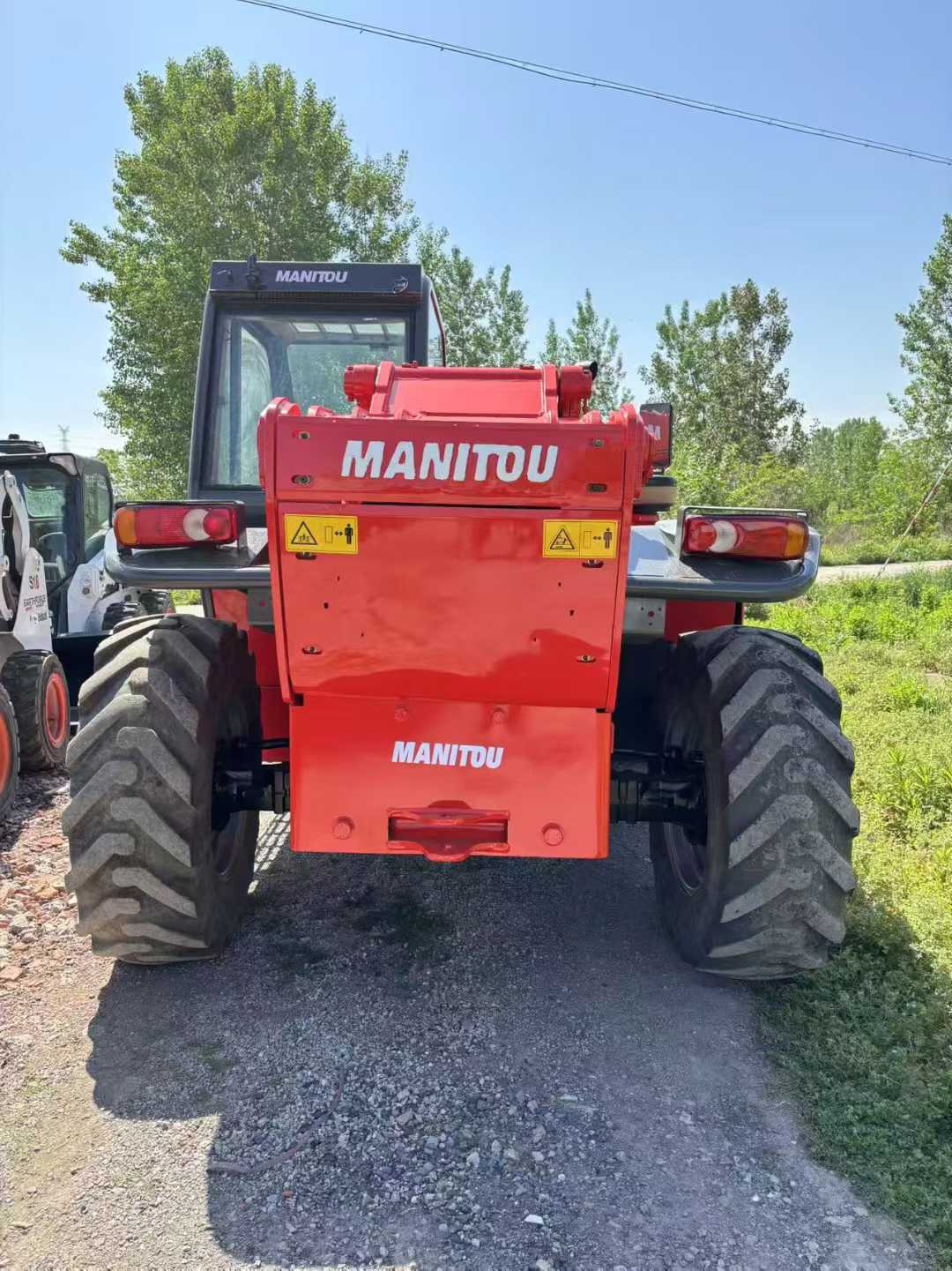 Manitou Long 12m Forklift with 3.5 ton capacity, telescopic wall fork.