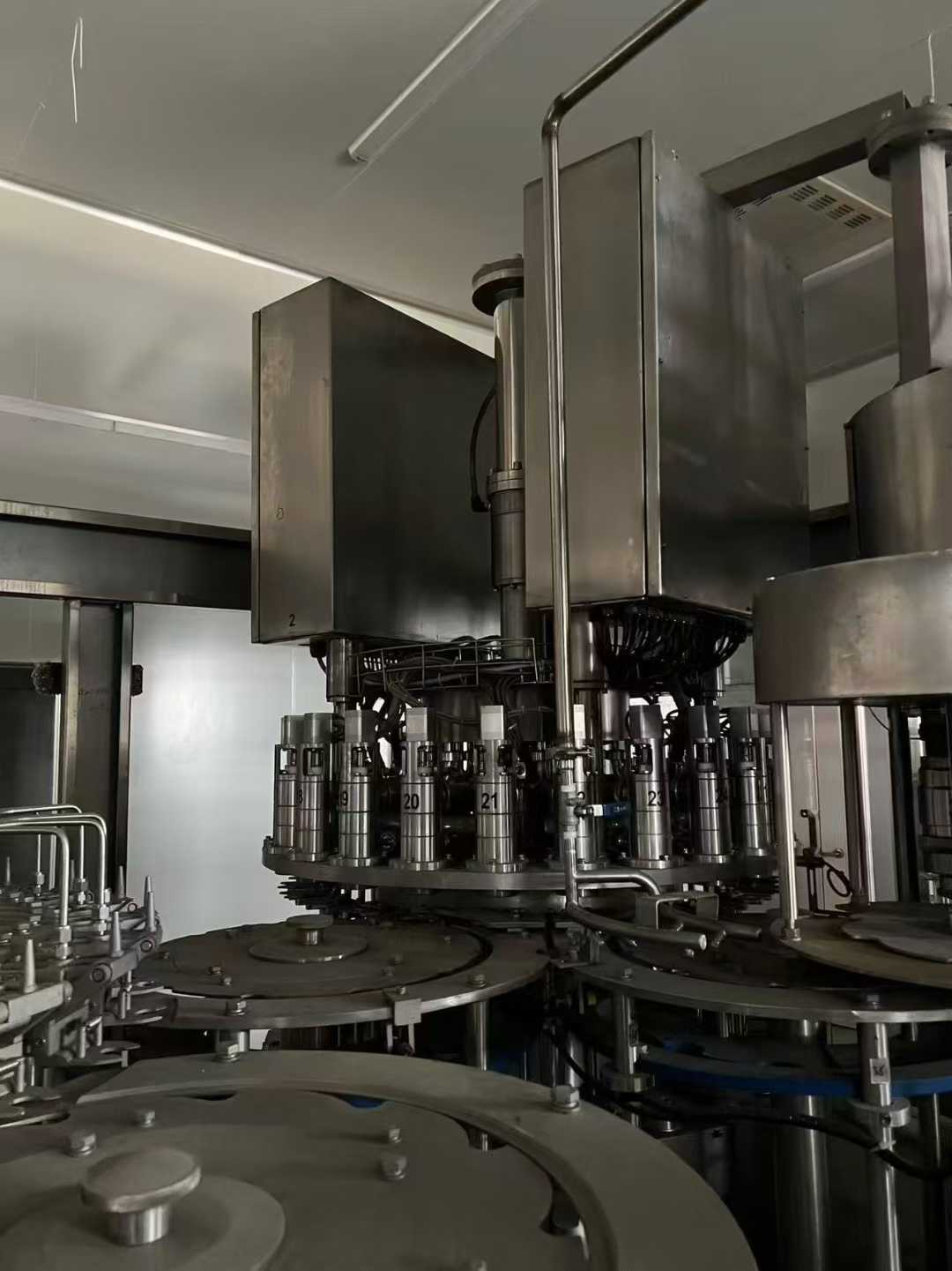 A Star A24 head (28 outlets) beverage filling machine, installed and only tested/produced once, in standby mode.