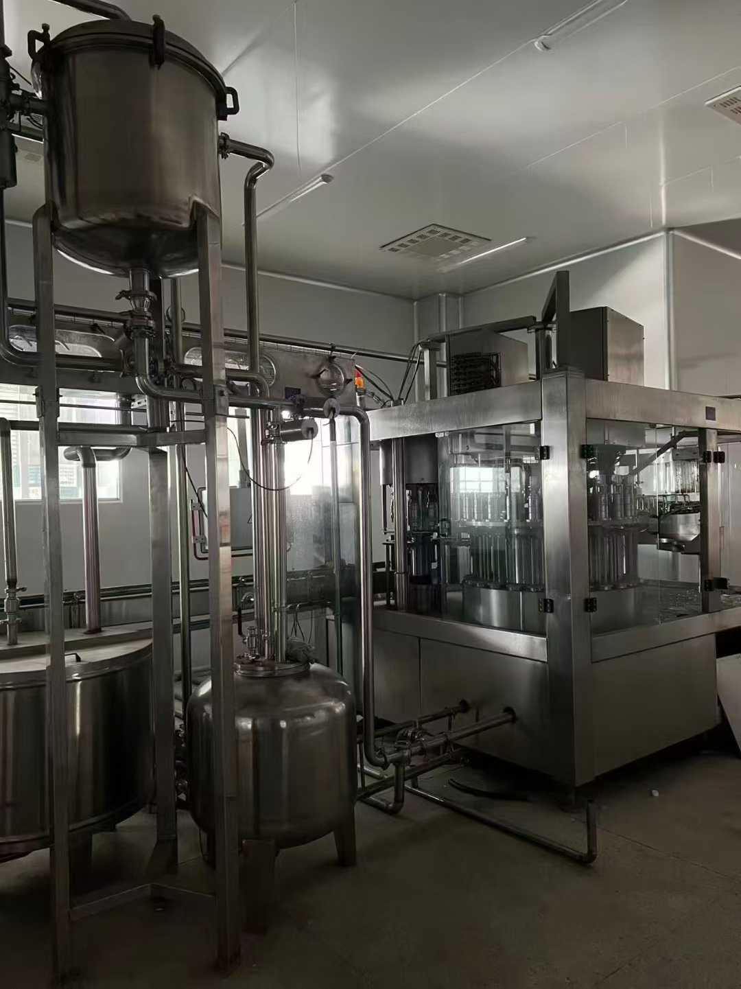 A Star A24 head (28 outlets) beverage filling machine, installed and only tested/produced once, in standby mode.