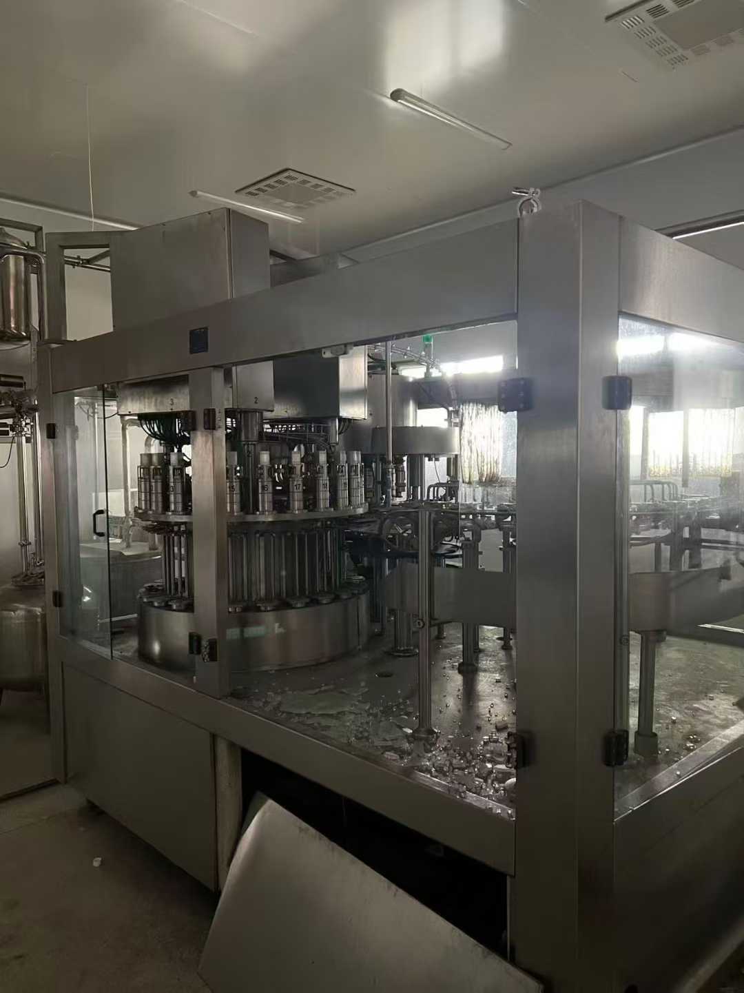 A Star A24 head (28 outlets) beverage filling machine, installed and only tested/produced once, in standby mode.