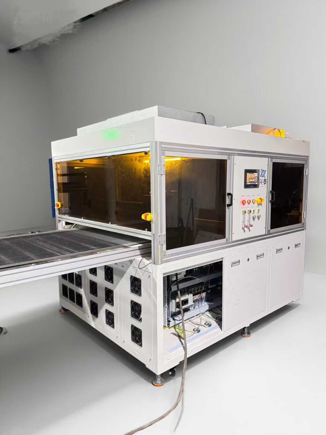 A double plasma coating machine with a 1m wide web belt, highly equipped, year 2021.