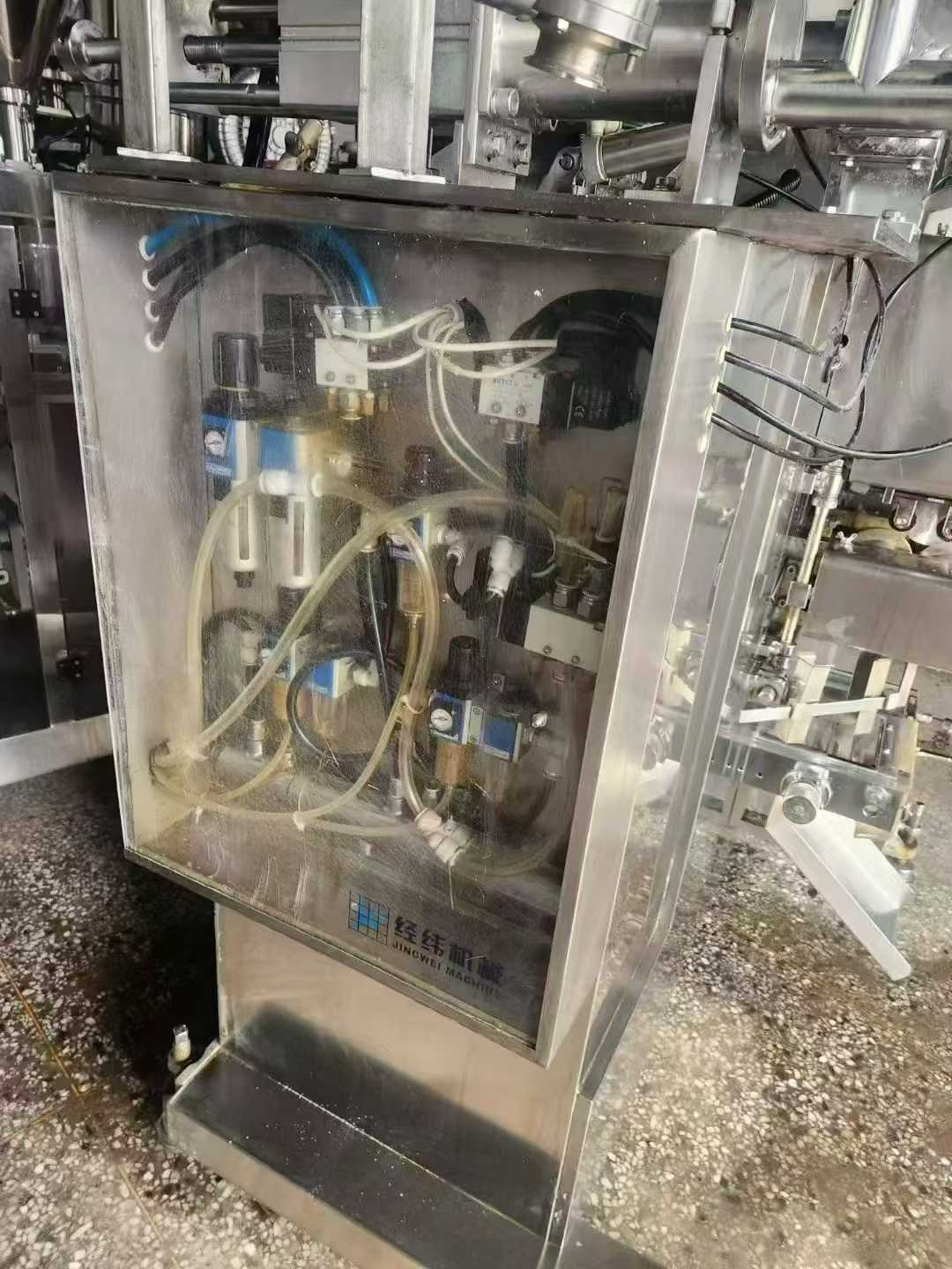 Two Jingwei JG3300 sauce filling machines; the machines have not been used much.