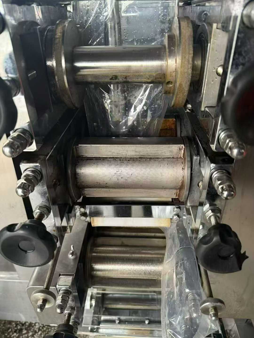 Two Jingwei JG3300 sauce filling machines; the machines have not been used much.