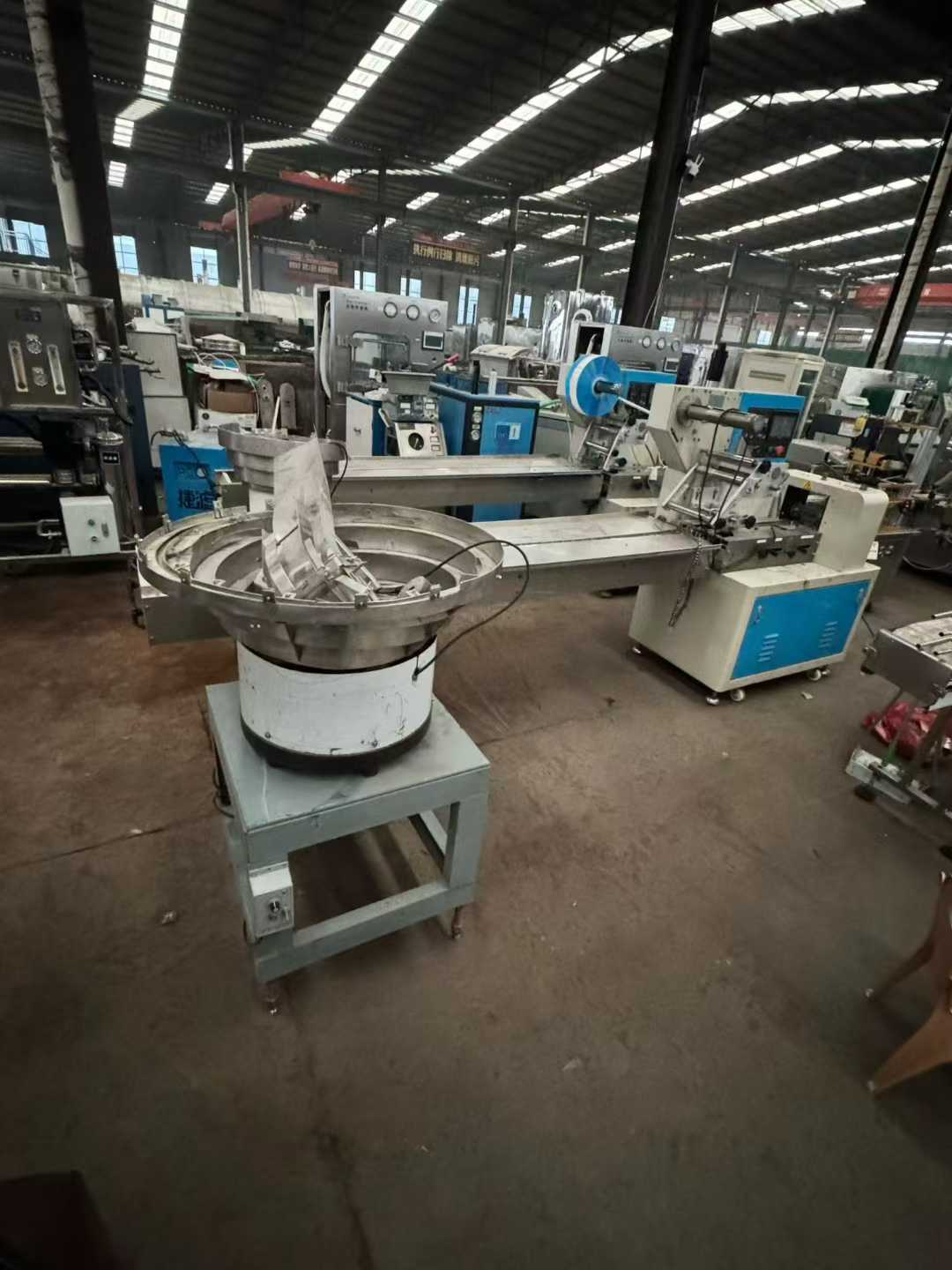 3-ton water storage tank, cigarette wrapper machine, 250-roll pillow packaging machine, box-sealing machine.