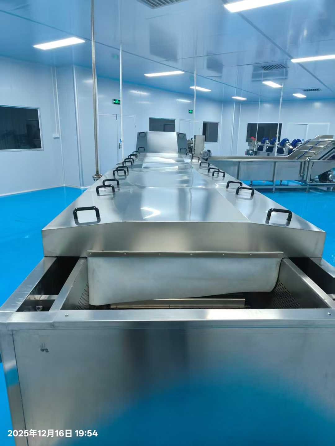 A set of machinery for cleaning, drying, and pasteurizing/cooling food products. The machinery was installed in 2023 but has not been used.
