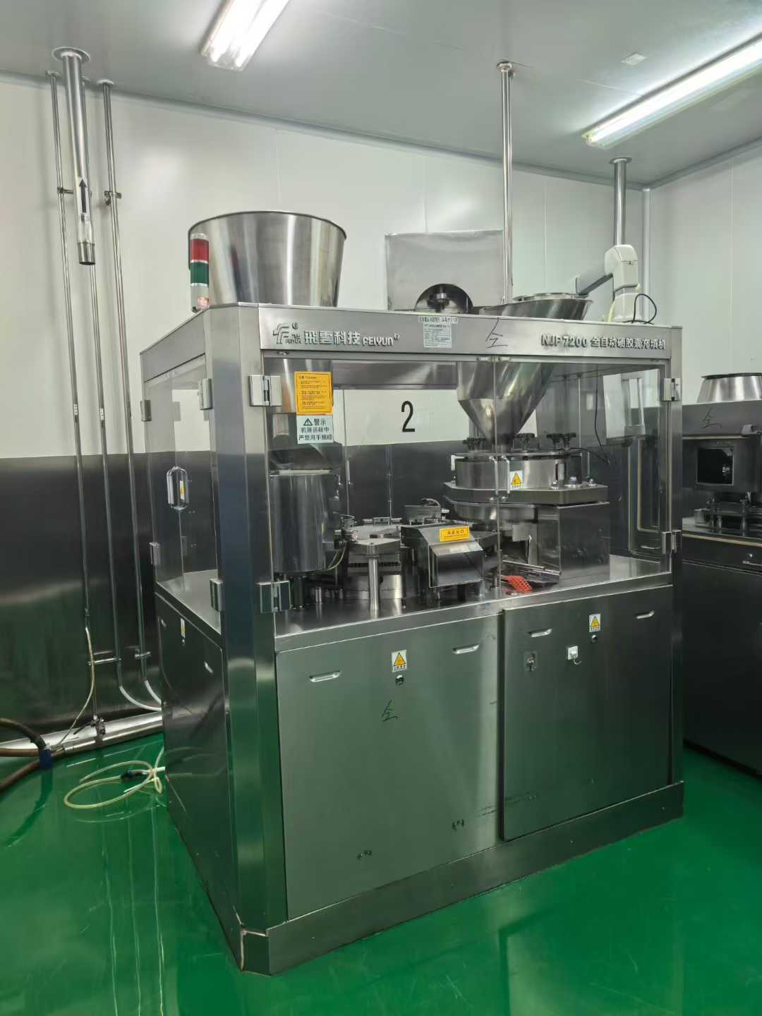 Pharmaceutical machinery: Model 120 Fluid Bed Granulator, Model 7200 Capsule Filling Machine with Mold No. 1.