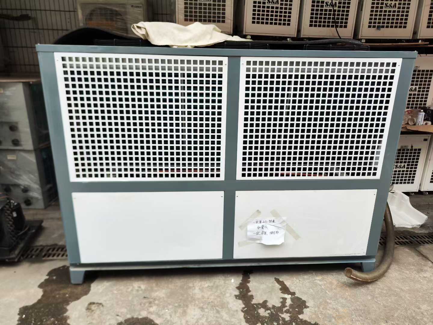 A 0-horsepower industrial refrigeration unit has arrived. It is nearly new, with a built-in water pump and water tank.