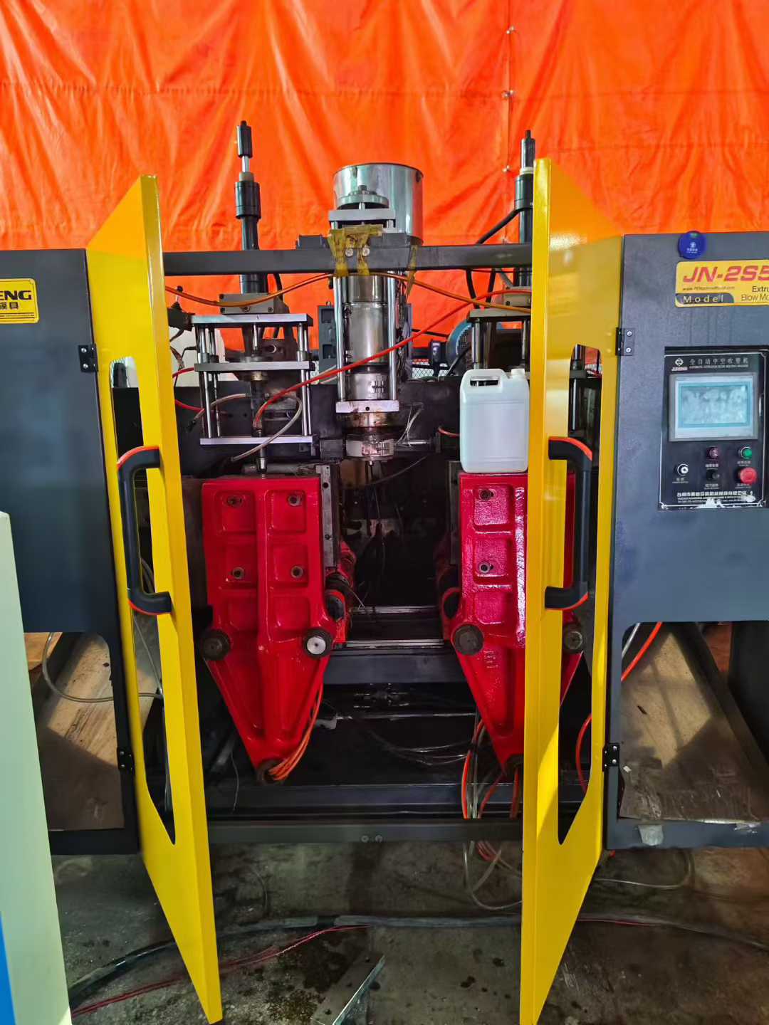 Blow molding machine.