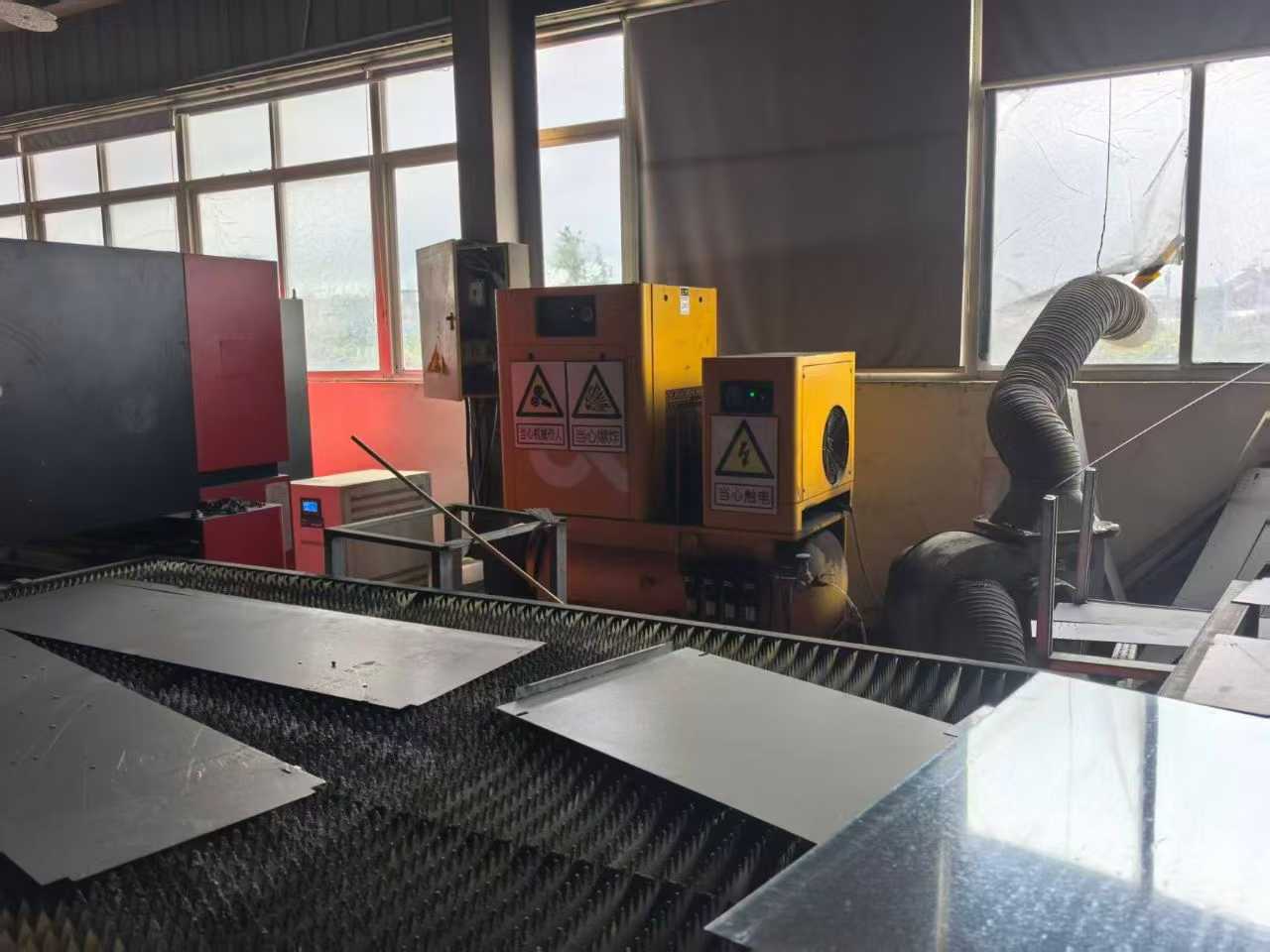 Laser cutting machine.