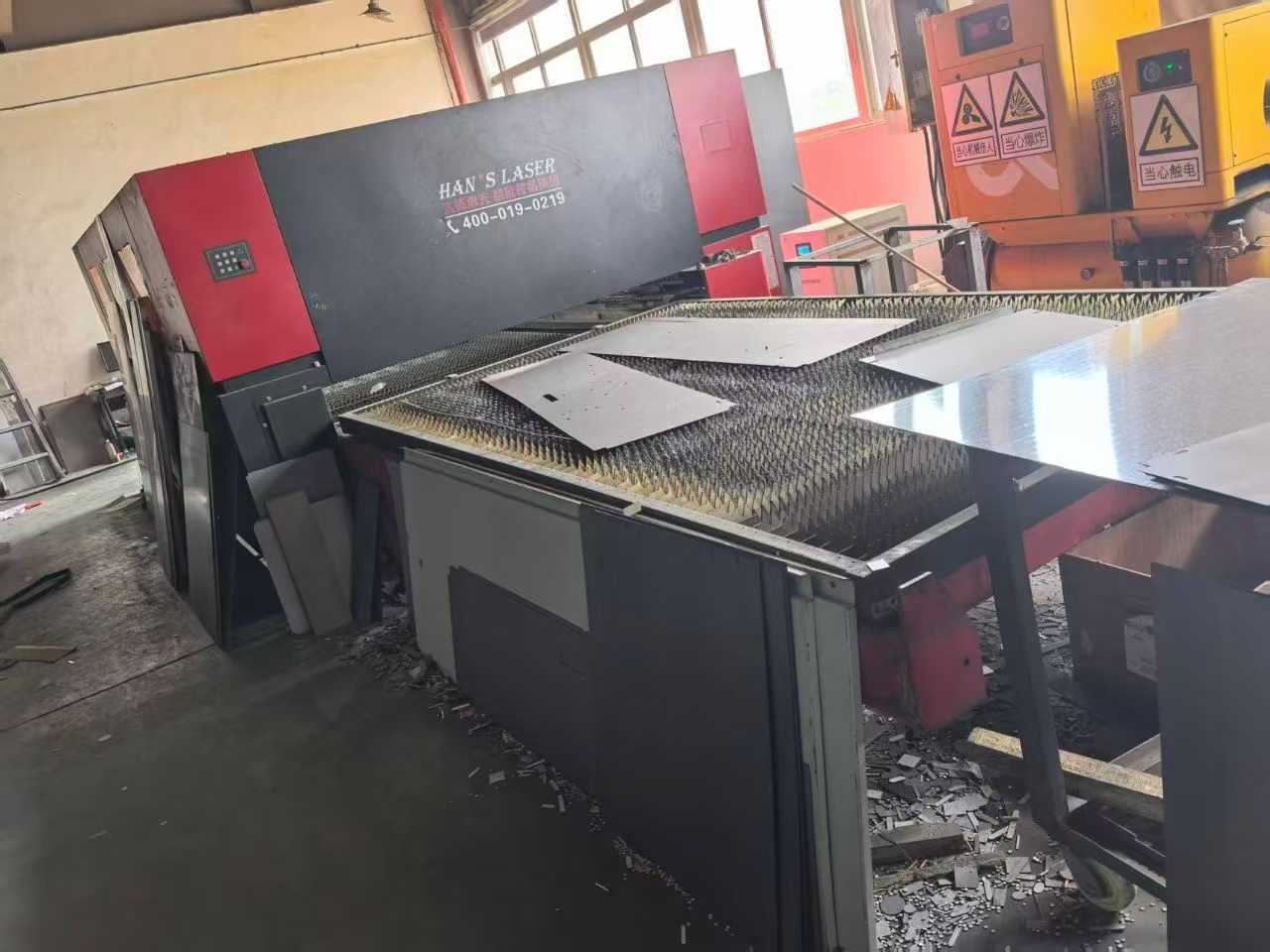Laser cutting machine.