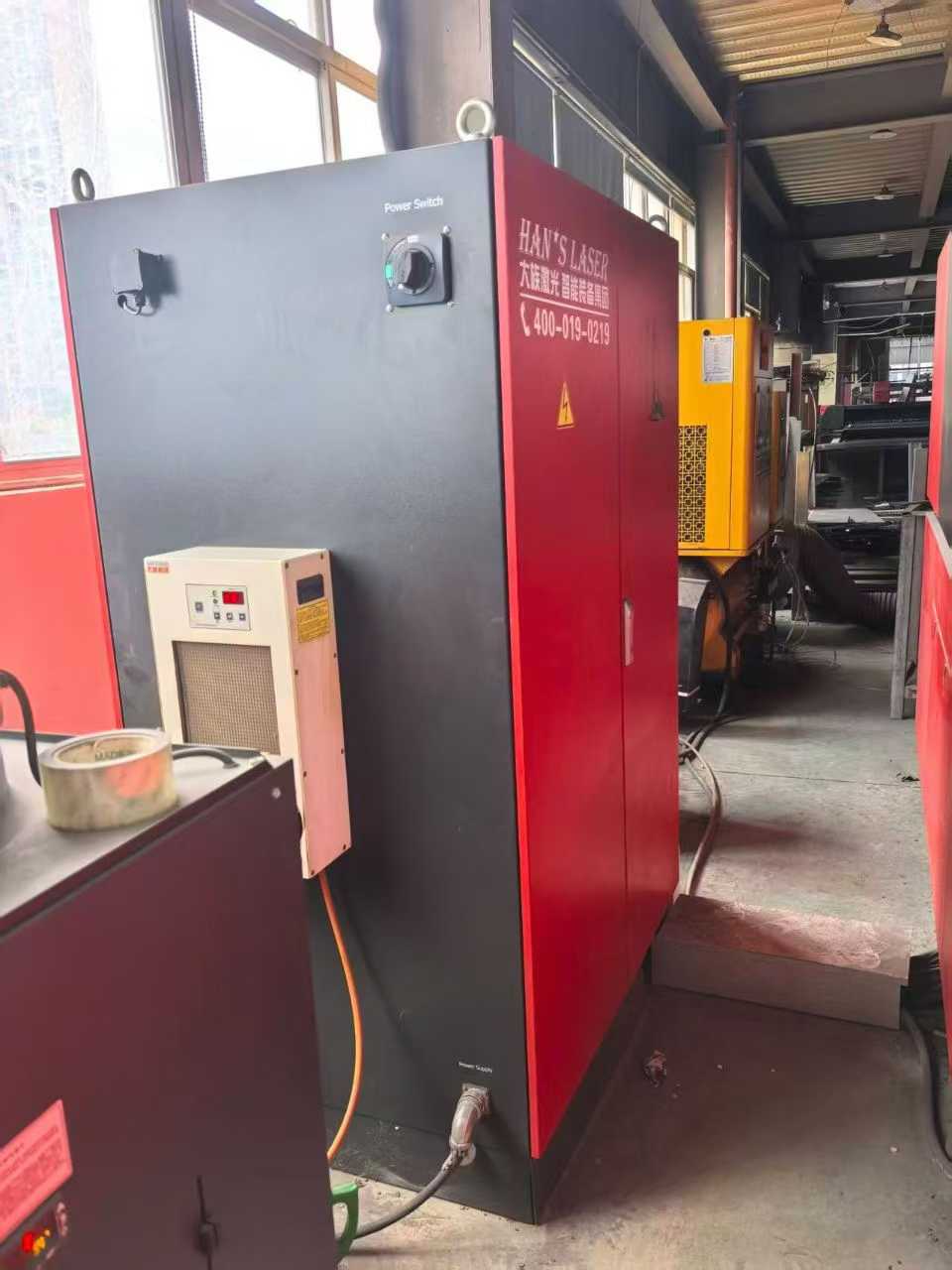 Laser cutting machine.