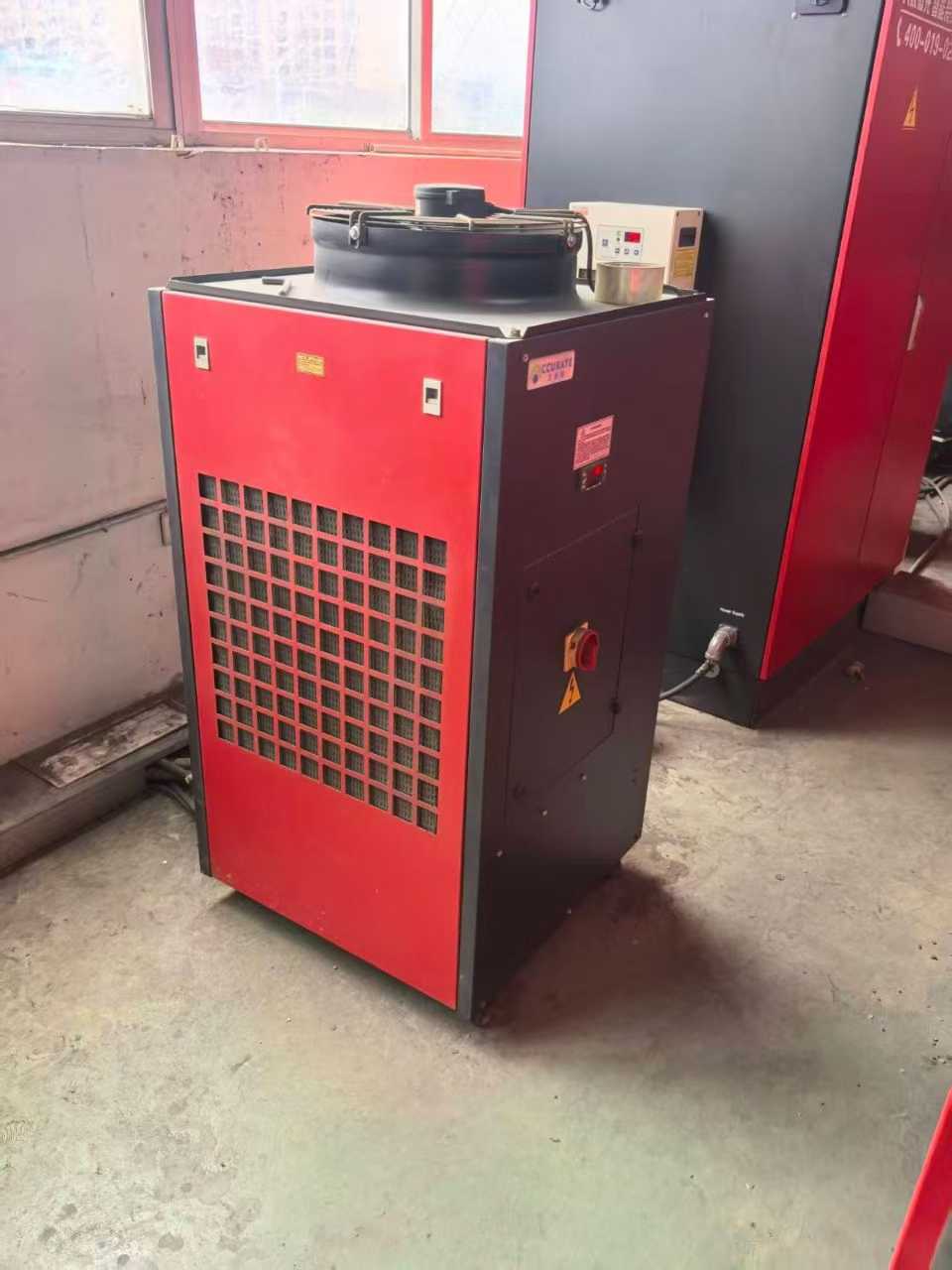 Laser cutting machine.