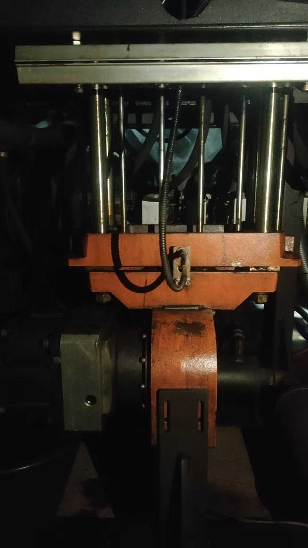 RiBo Blow Molding Machine, one output for six units, with three sets of molds.