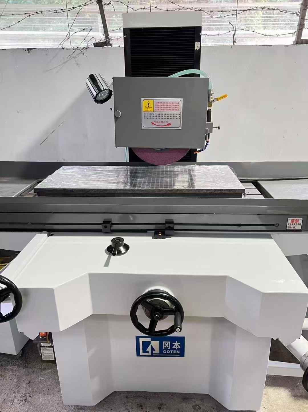 Okamoto Big Water Grinding Machine. Dimensions: 450 × 1000 Two-axis automatic operation; precision down to one thread.