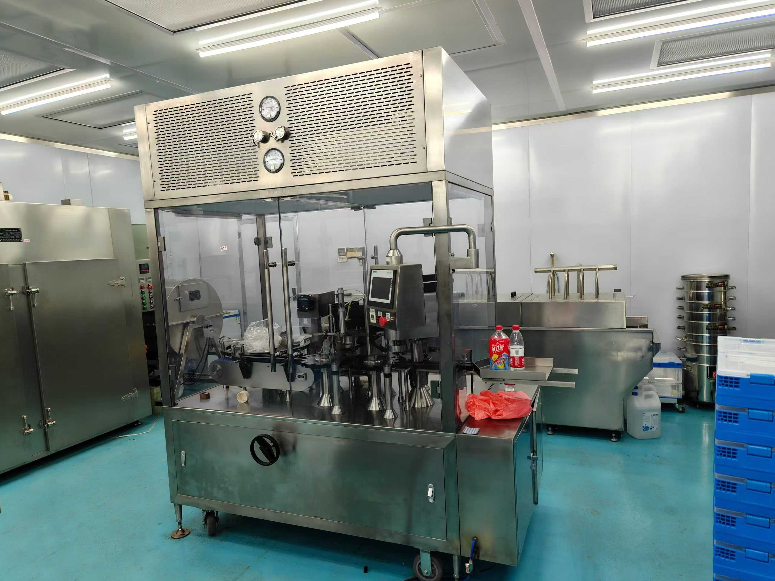 Boxing machine with adhesive application function + transparent film packaging machine.