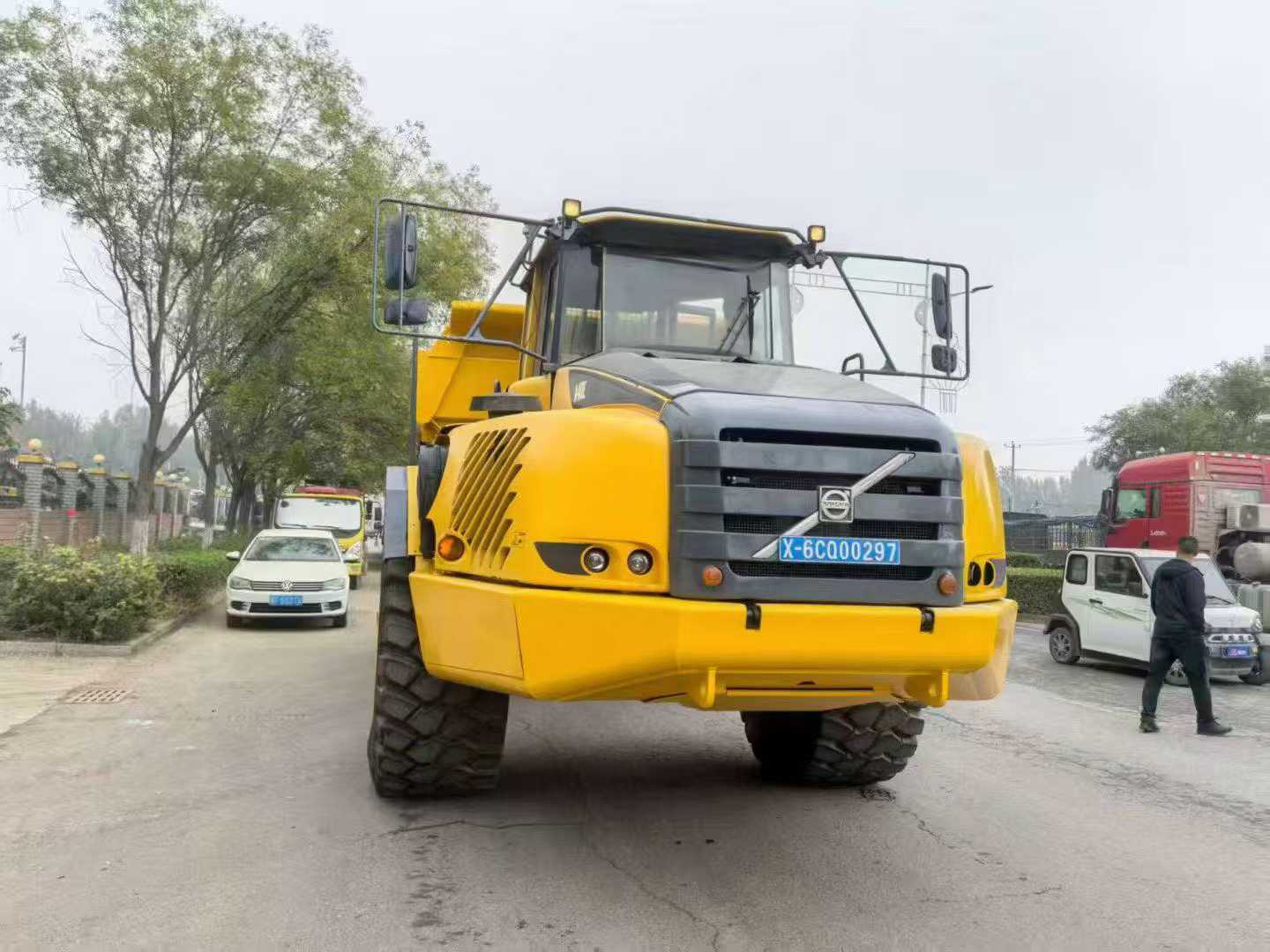 Volvo A40 grapple crane.