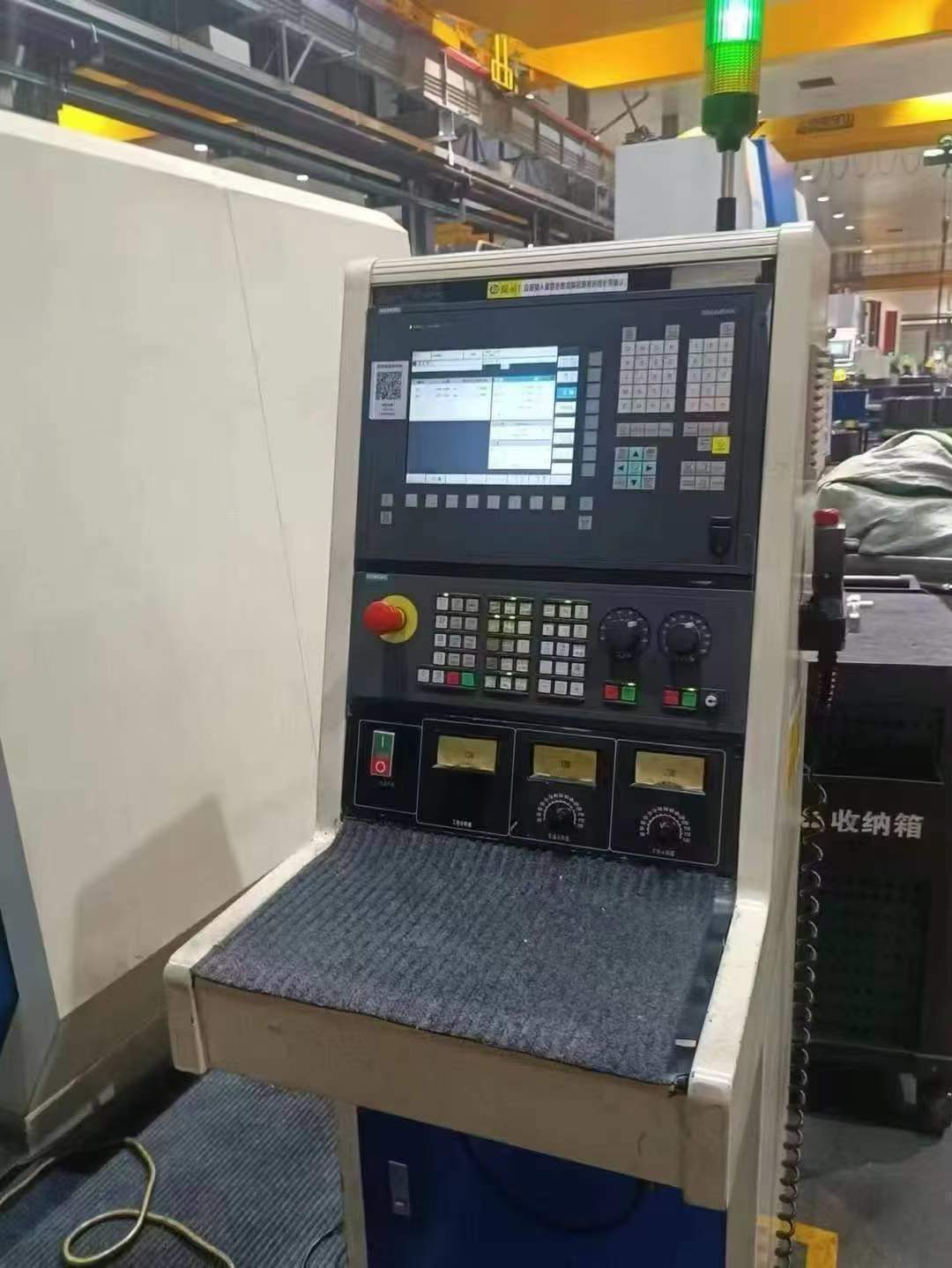 Tianjin Second Machinery Co., Ltd. CNC vertical mill 2MKM95200. Worktable 2000, passes through a diameter of 2100. The workbench can support a load of 6 tons.