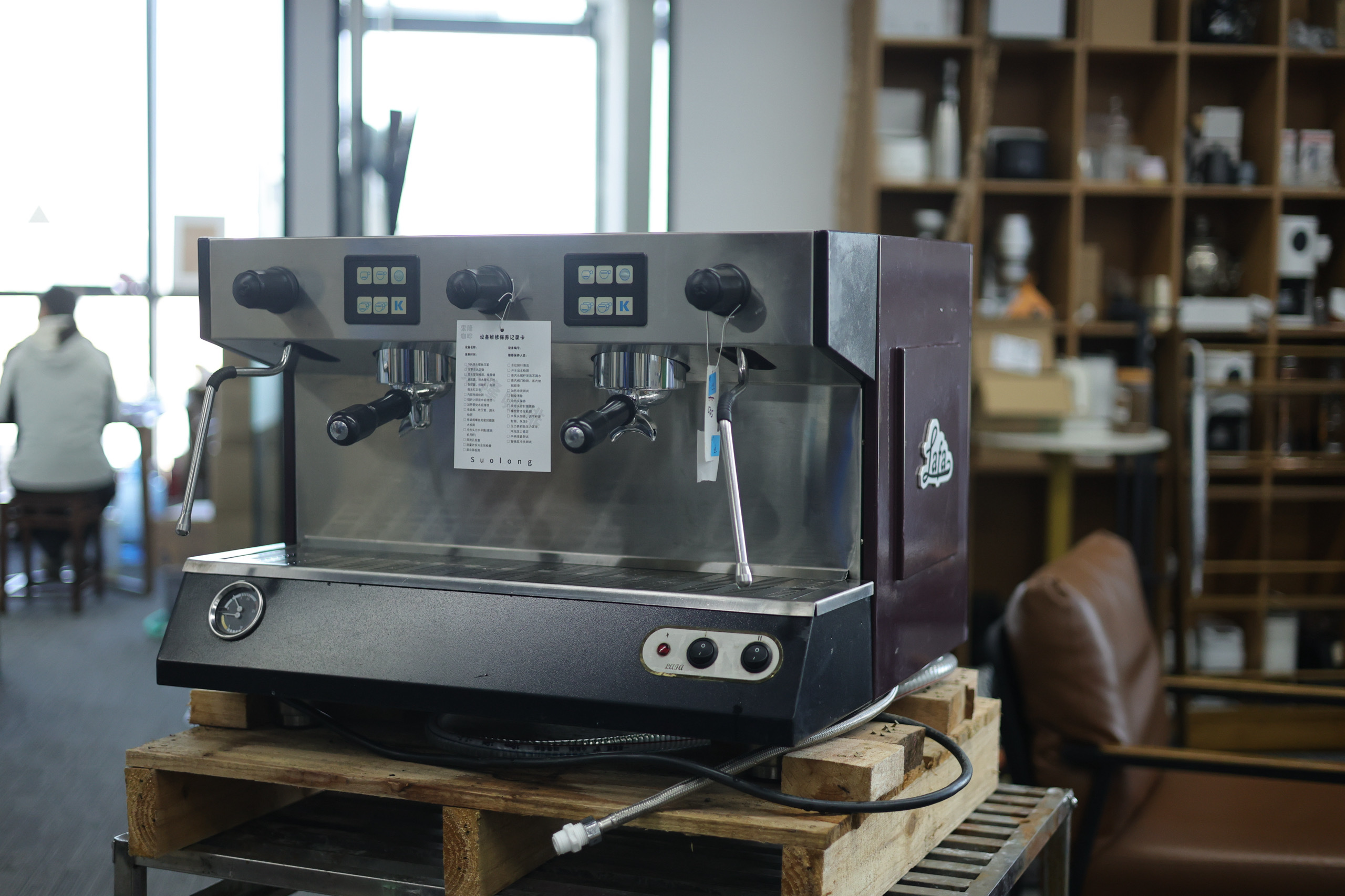 Domestic dual-head semi-automatic coffee machine.