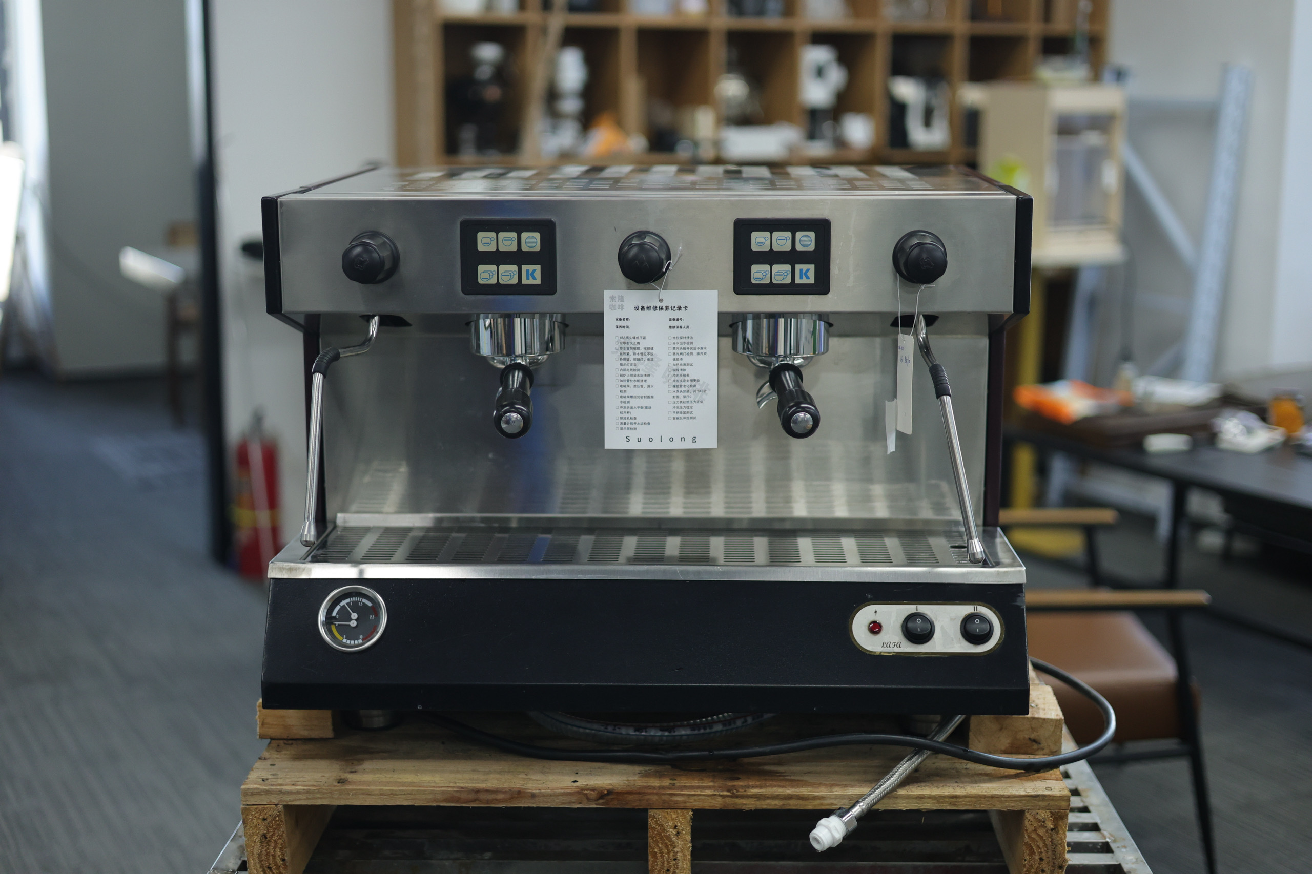 Domestic dual-head semi-automatic coffee machine.