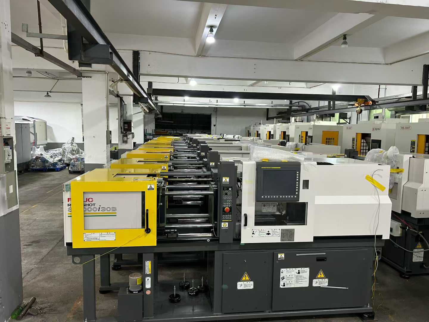 A batch of FANUC 30B and 30A optical electric injection molding machines, with exceptionally well-maintained machinery.